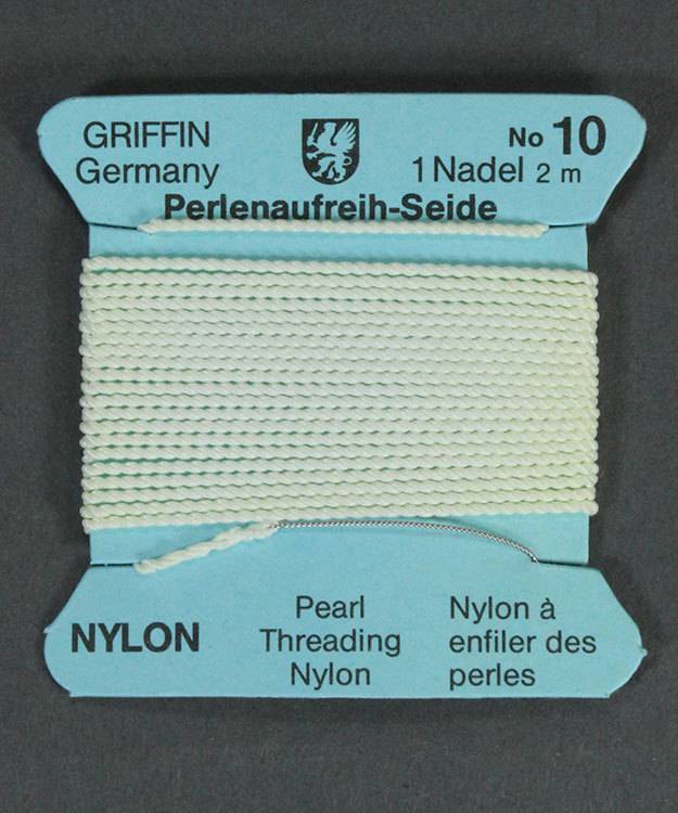 38.0830 = White Nylon Beading Cord #10 on Card with Needle