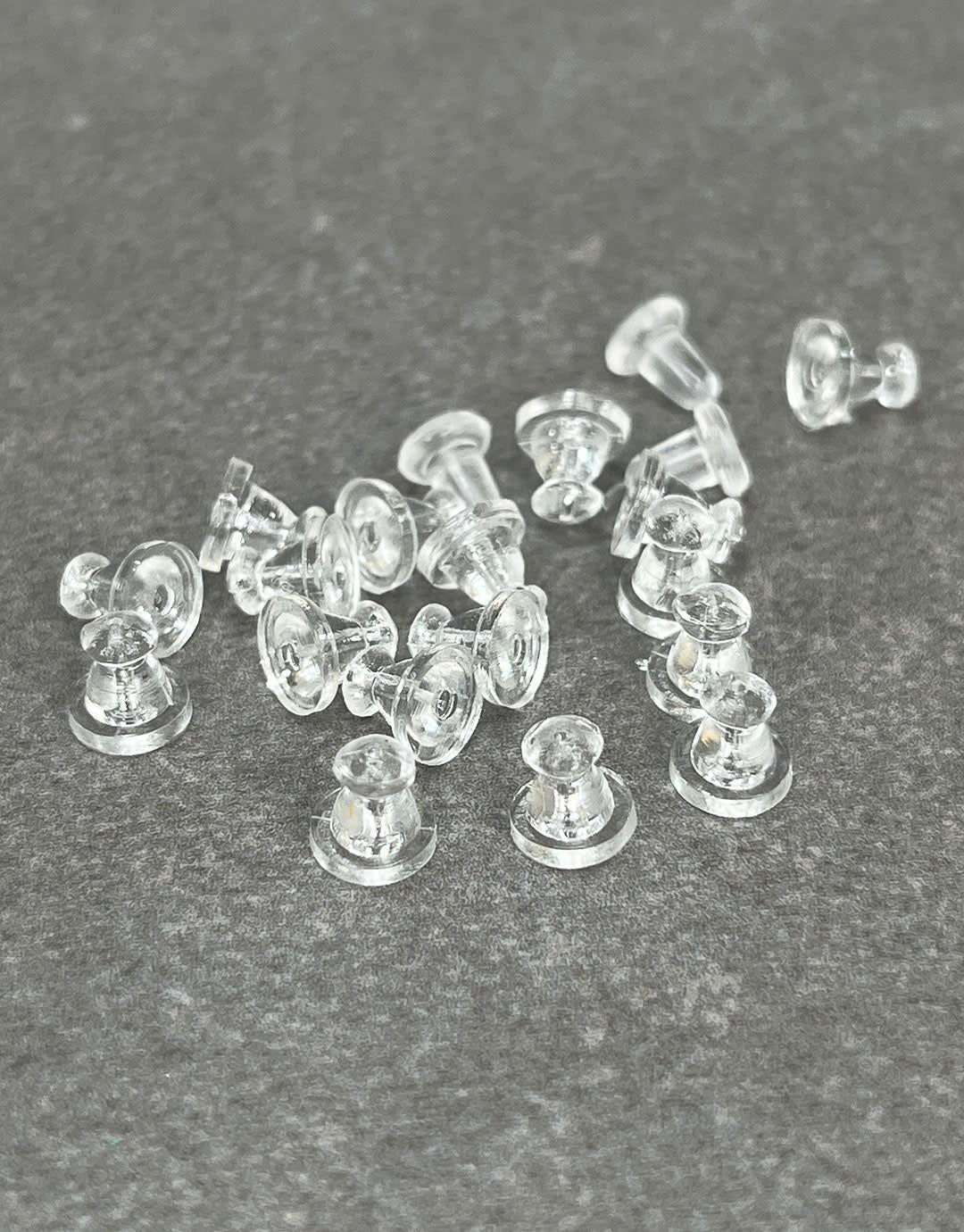 909C-97 = PLASTIC EARRING BACK (Pkg of 144)