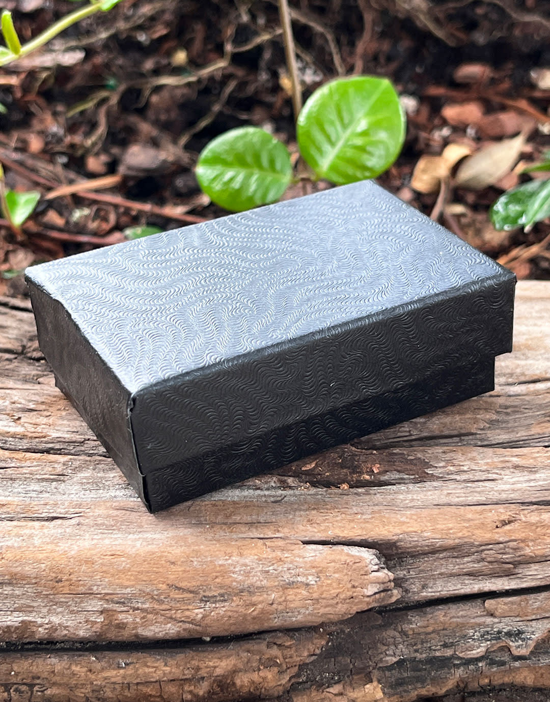 DBX2821B = BOXES - COTTON FILLED BLACK SWIRL 2-5/8'' x 1-1/2'' x 7/8'' CASE 100