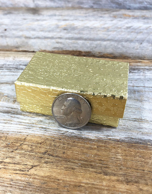 DBX2821G = BOXES - COTTON FILLED GOLD FOIL 2-5/8'' x 1-1/2'' x 7/8'' CASE 100