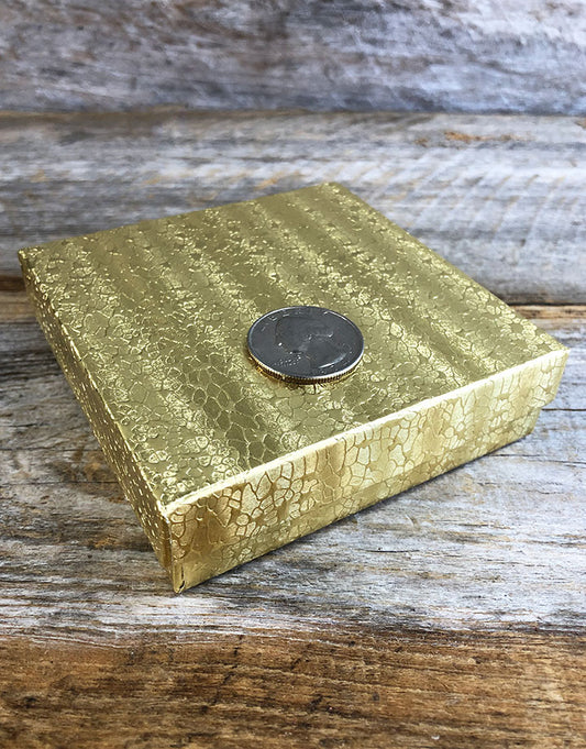 DBX2833G = BOXES - COTTON FILLED GOLD FOIL 3-1/2'' x 3-1/2'' x 1'' CASE 100