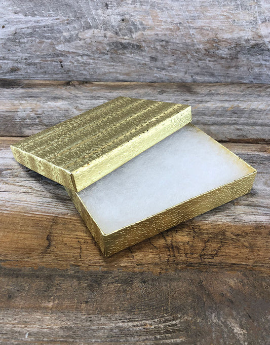 DBX2853G = BOXES - COTTON FILLED GOLD FOIL 5-3/8'' x 3-7/8'' x 1'' CASE 100