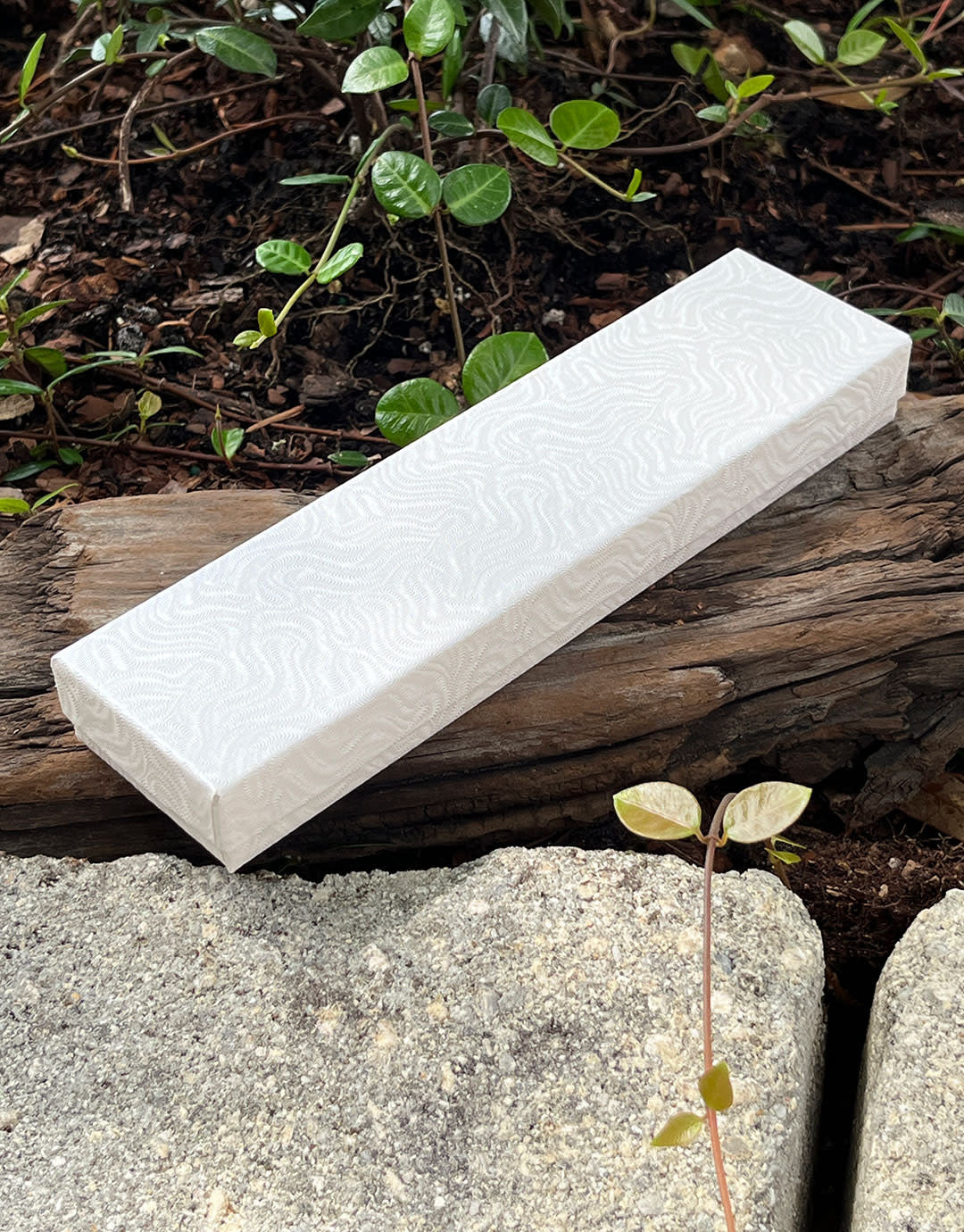 DBX2882W = Cotton Filled Box White Swirl 8'' x 2'' x 1'' (Case of 100)