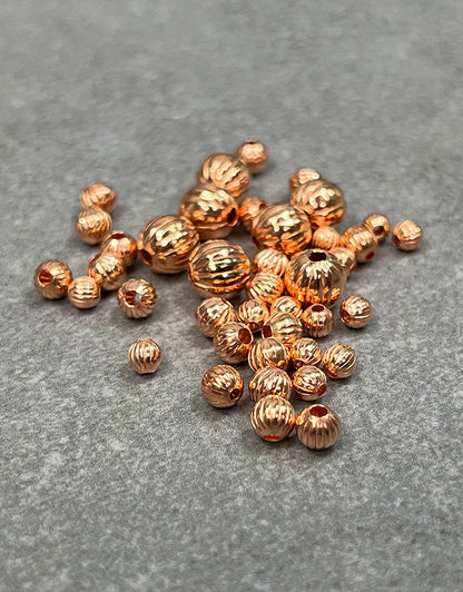 ABCU-C = Copper Corrugated Beads