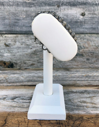 DBR6195 = White Leatherette Oval Bracelet Bar 7-1/2x6-1/2'' high