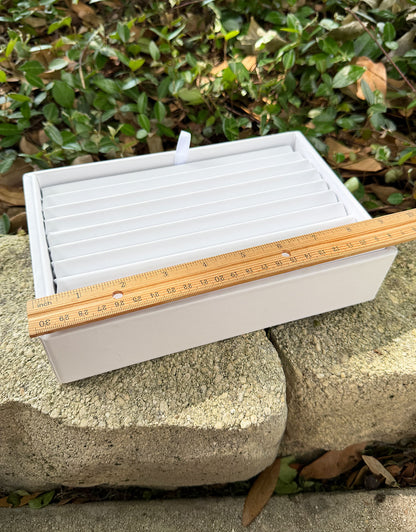 DBR6963 = White Leatherette Stackable Bracelet Tray with 8 Slots