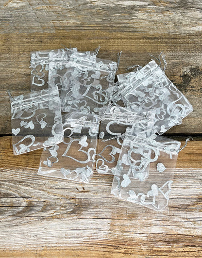 DBX1292HW = Organza Drawstring Pouches White with Silver Hearts 2-3/4''x3'' (Pkg/10)