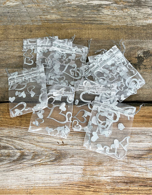 DBX1292HW = Organza Drawstring Pouches White with Silver Hearts 2-3/4''x3'' (Pkg/10)