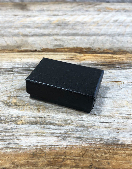 DBX2810B = BOXES - COTTON FILLED BLACK SWIRL  1-7/8'' x 1-1/4'' x 5/8''   CASE 100