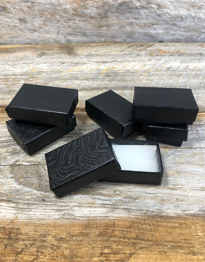 DBX2810B = BOXES - COTTON FILLED BLACK SWIRL  1-7/8'' x 1-1/4'' x 5/8''   CASE 100