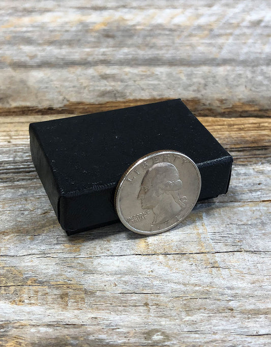 DBX2810B = BOXES - COTTON FILLED BLACK SWIRL  1-7/8'' x 1-1/4'' x 5/8''   CASE 100