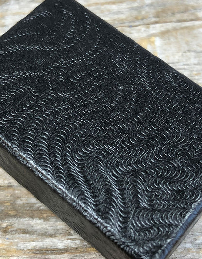 DBX2810B = BOXES - COTTON FILLED BLACK SWIRL  1-7/8'' x 1-1/4'' x 5/8''   CASE 100