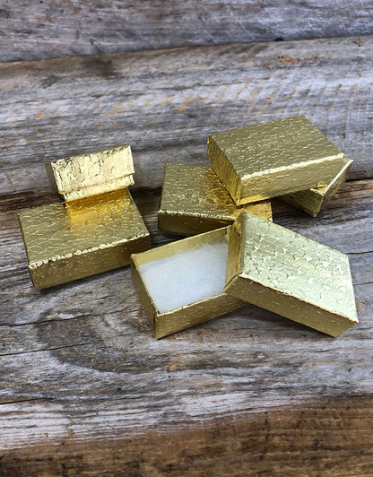 DBX2810G = BOXES - COTTON FILLED GOLD FOIL  1-7/8'' x 1-1/4'' x 5/8''   CASE 100