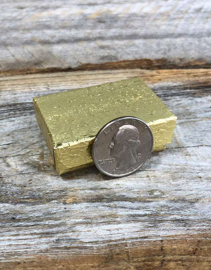 DBX2810G = BOXES - COTTON FILLED GOLD FOIL  1-7/8'' x 1-1/4'' x 5/8''   CASE 100