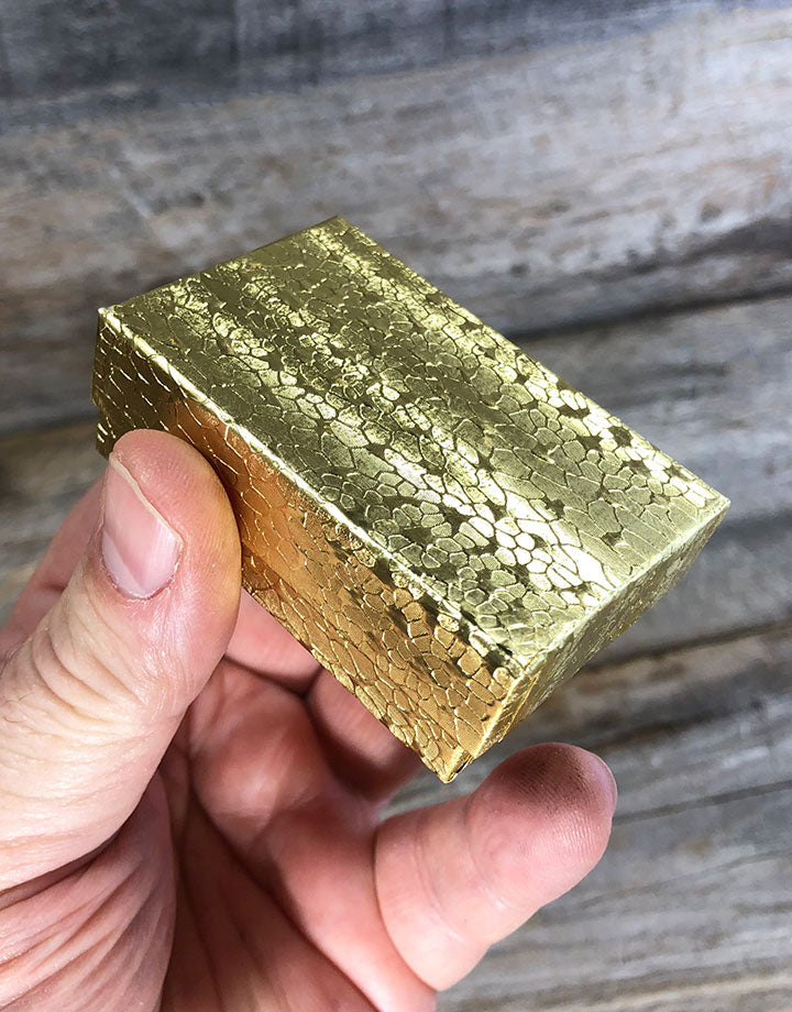 DBX2821G = BOXES - COTTON FILLED GOLD FOIL  2-5/8'' x 1-1/2'' x 7/8''   CASE 100