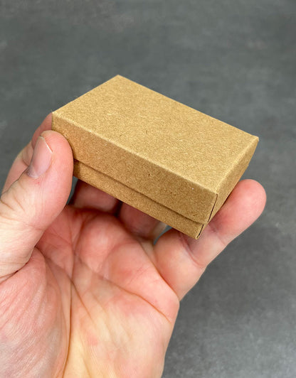 DBX2821K = BOXES - COTTON FILLED KRAFT  2-5/8'' x 1-1/2'' x 7/8''   CASE 100