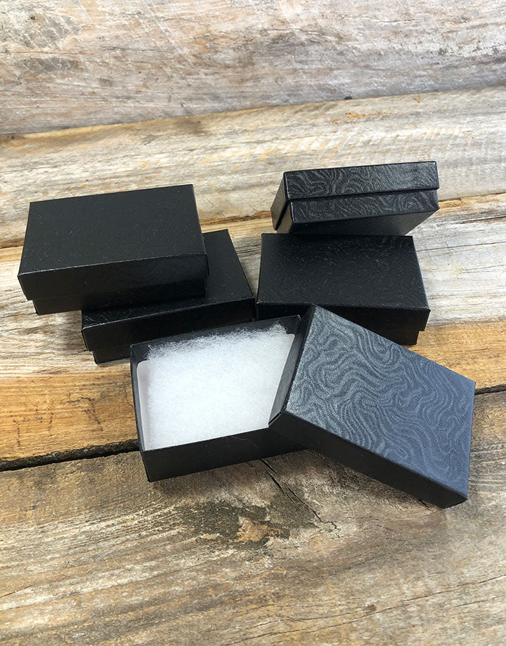 DBX2832B = BOXES - COTTON FILLED BLACK SWIRL  3-1/4'' x 2-1/4'' x 1''  CASE 100
