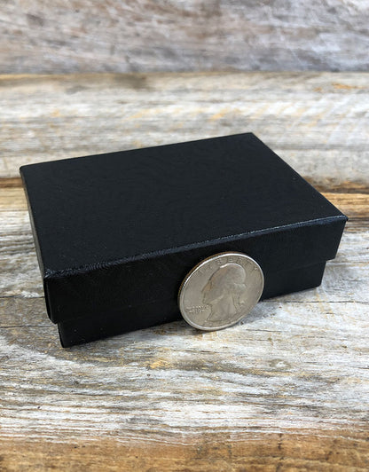 DBX2832B = BOXES - COTTON FILLED BLACK SWIRL  3-1/4'' x 2-1/4'' x 1''  CASE 100