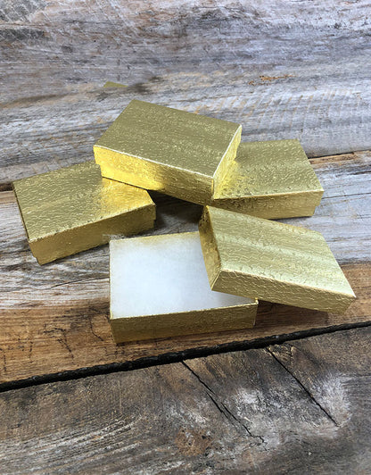 DBX2832G = BOXES - COTTON FILLED GOLD FOIL  3-1/4'' x 2-1/4'' x 1''  CASE 100