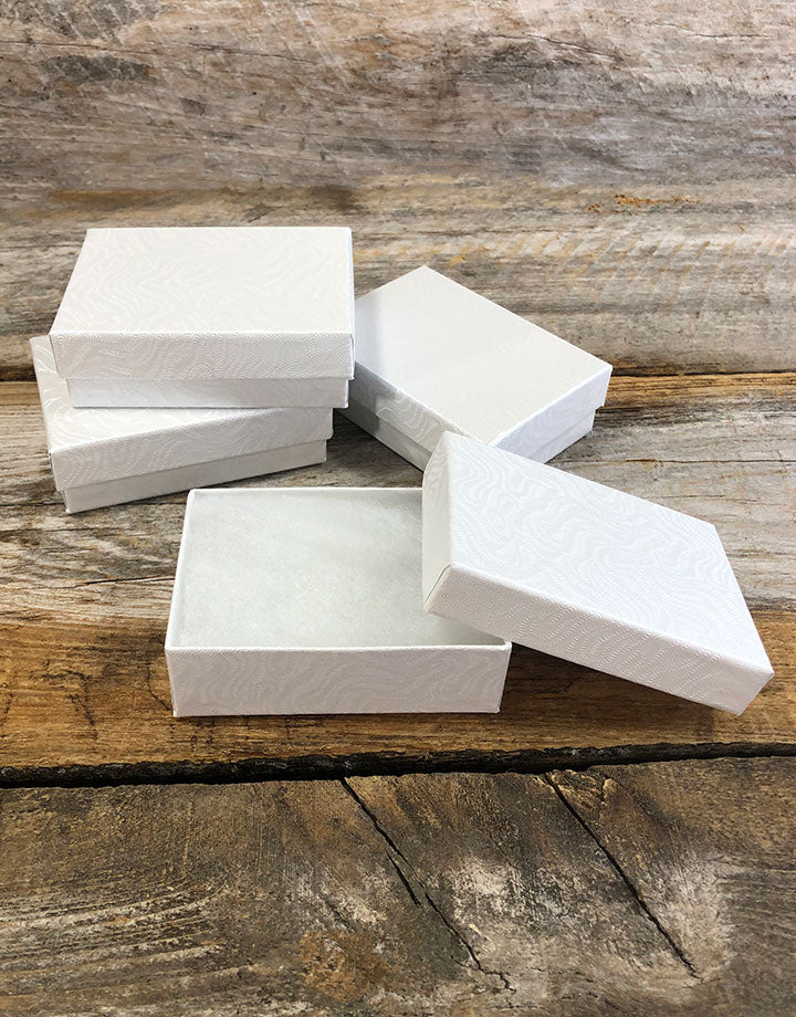 DBX2832W = BOXES - COTTON FILLED WHITE  3-1/4'' x 2-1/4'' x 1''  CASE 100
