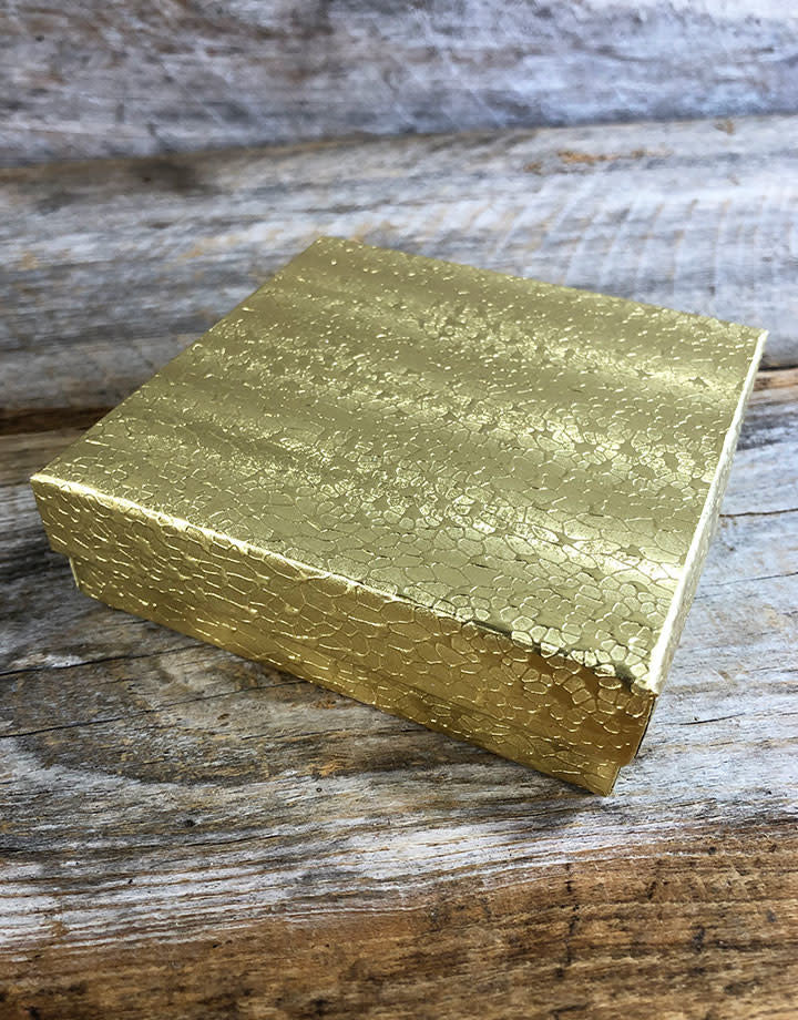DBX2833G = BOXES - COTTON FILLED GOLD FOIL  3-1/2'' x 3-1/2'' x 1''  CASE 100