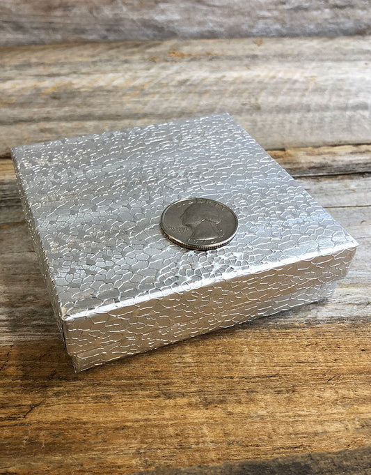 DBX2833S = BOXES - COTTON FILLED SILVER FOIL  3-1/2'' x 3-1/2'' x 1''  CASE 100