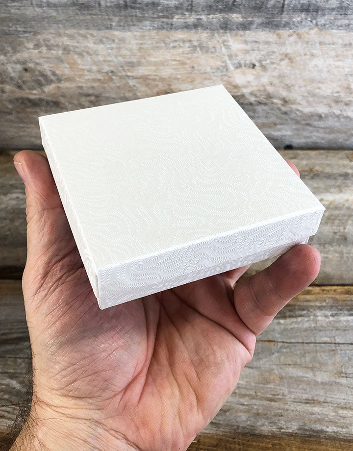 DBX2833W = BOXES - COTTON FILLED WHITE  3-1/2'' x 3-1/2'' x 1''  CASE 100