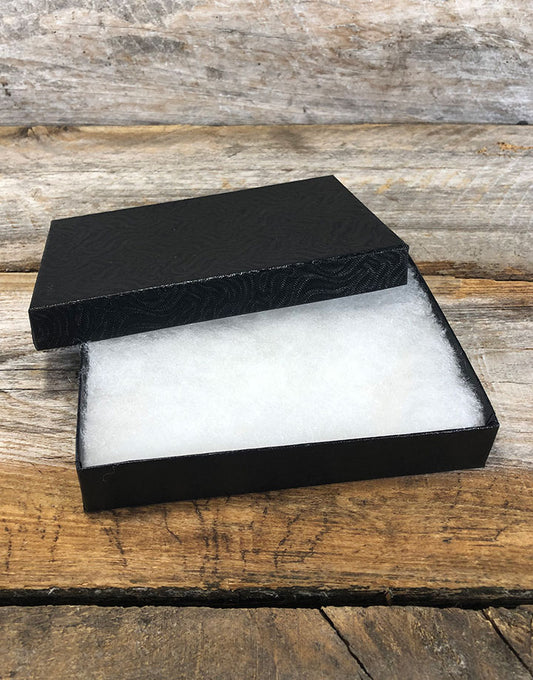 DBX2853B = BOXES - COTTON FILLED BLACK SWIRL  5-3/8'' x 3-7/8'' x 1''  CASE 100