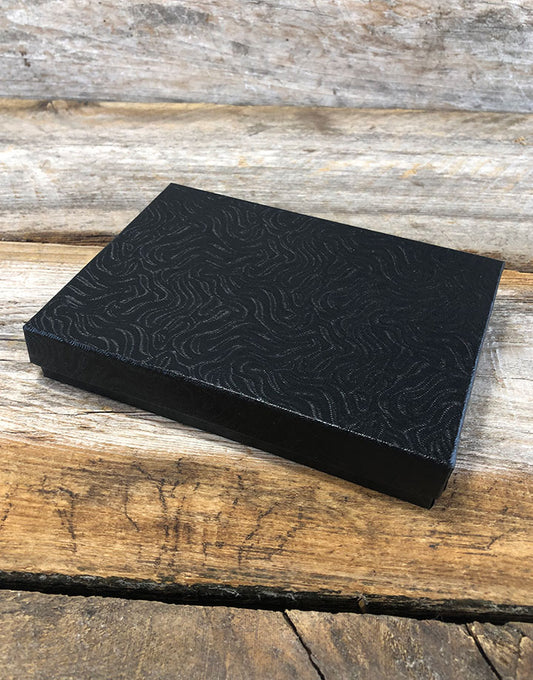 DBX2853B = BOXES - COTTON FILLED BLACK SWIRL  5-3/8'' x 3-7/8'' x 1''  CASE 100