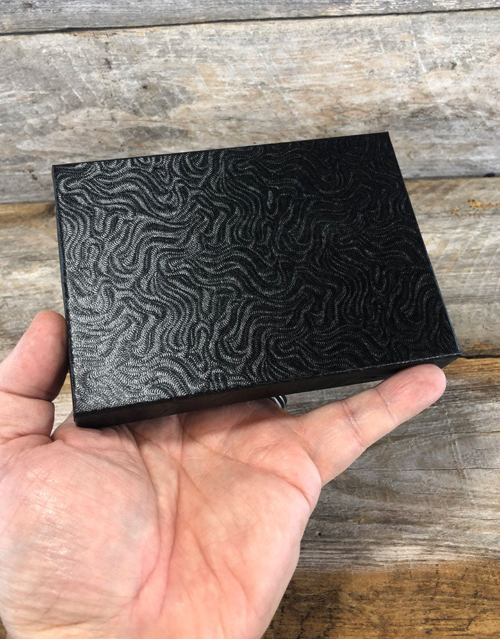 DBX2853B = BOXES - COTTON FILLED BLACK SWIRL  5-3/8'' x 3-7/8'' x 1''  CASE 100
