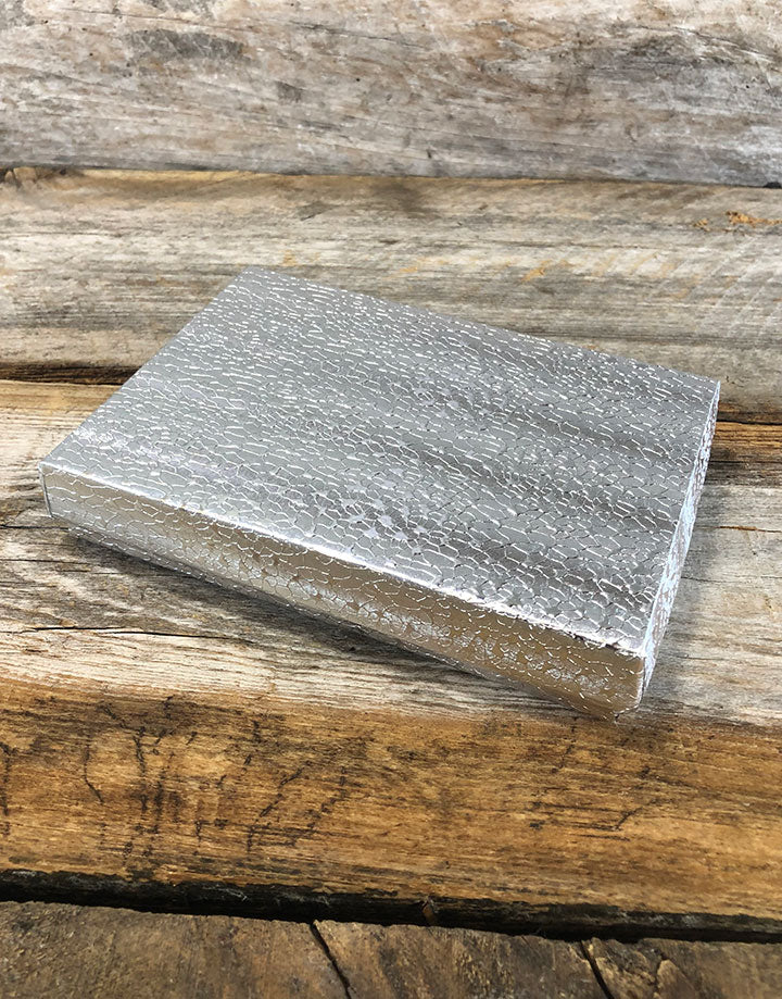 DBX2853S = BOXES - COTTON FILLED SILVER FOIL  5-3/8'' x 3-7/8'' x 1''  CASE 100