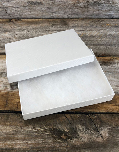 DBX2875W = BOXES - COTTON FILLED WHITE SWIRL  7-1/8'' x 5-1/8'' x 1-1/8''  CASE 100