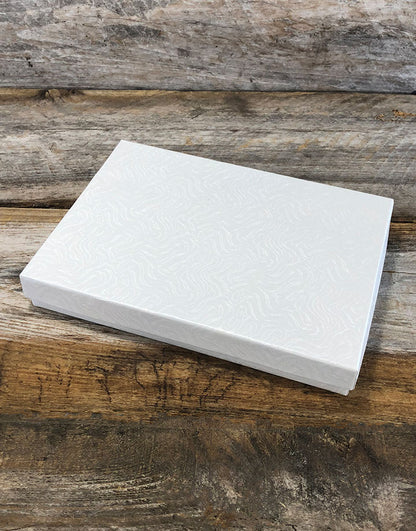 DBX2875W = BOXES - COTTON FILLED WHITE SWIRL  7-1/8'' x 5-1/8'' x 1-1/8''  CASE 100