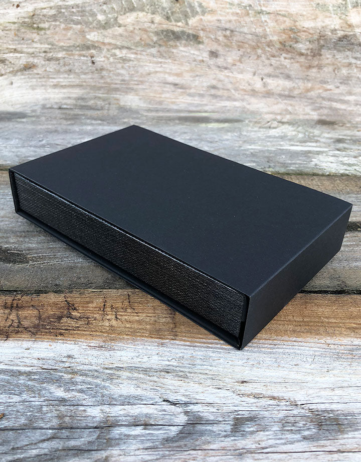DBX4255 = Deluxe Magnetic Black/Silver Necklace Box 4-3/4'' x 7-1/4'' x 1-1/8'' (Each)