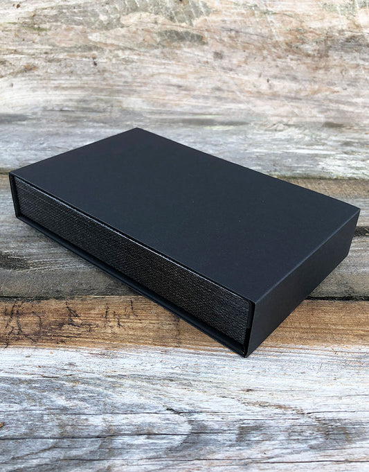 DBX4255 = Deluxe Magnetic Black/Silver Necklace Box 4-3/4'' x 7-1/4'' x 1-1/8'' (Each)