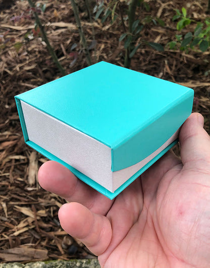 DBX4351 = Deluxe Magnetic Teal/White Combination Box 3-3/8" x 3-3/8" (Each)