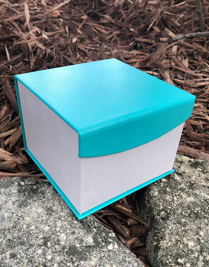 DBX4352 = Deluxe Magnetic Teal/White Watch Box 4" x 4" (Each)