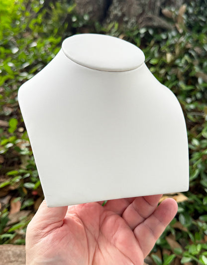 DCH6995 = White Leatherette Low Neck Form