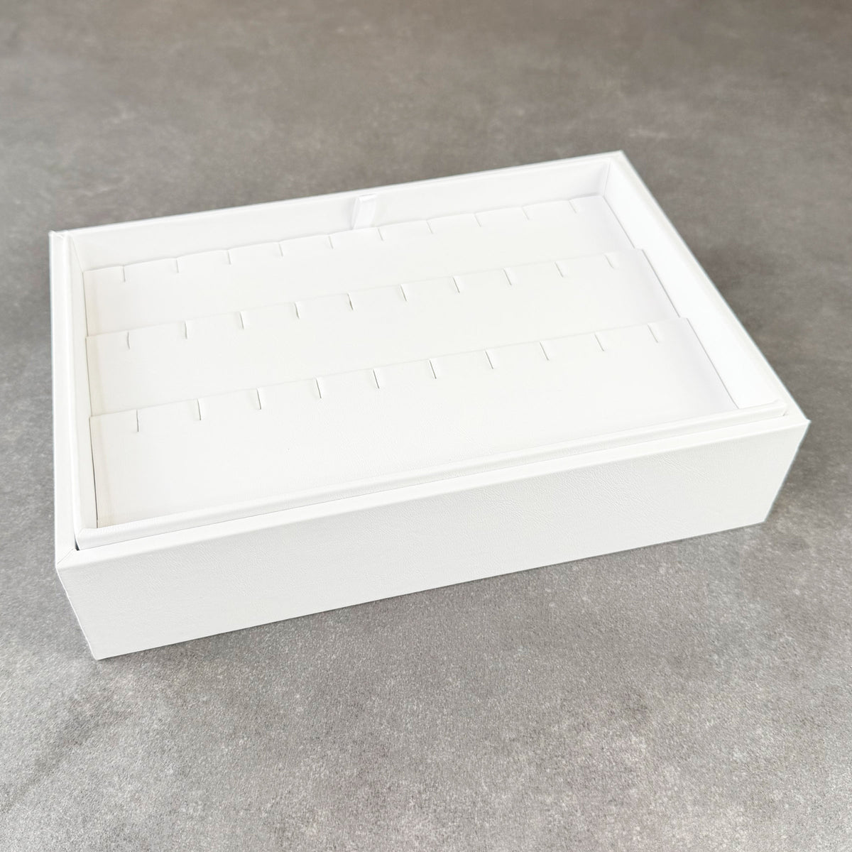 DER6965 = White Leatherette Stackable Earring Tray for 15 Pair