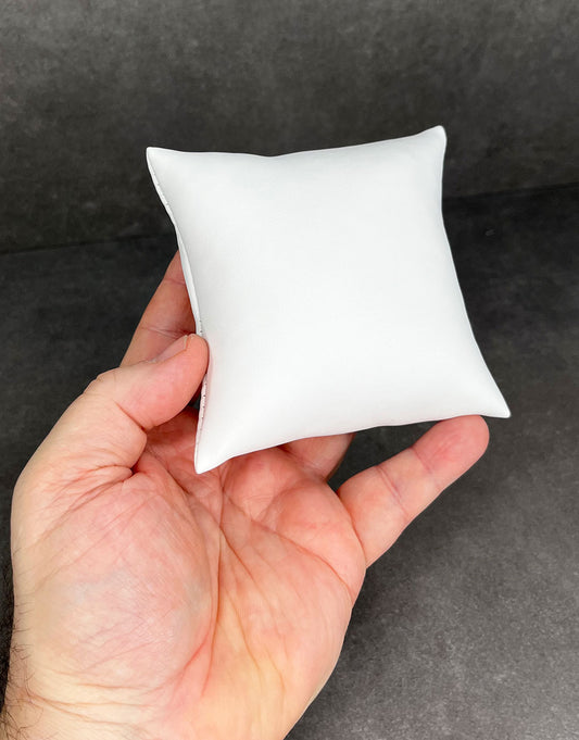 DIS6130 = White Leatherette Pillow for Watches or Bracelets 3''x3'' (Pkg of 5)