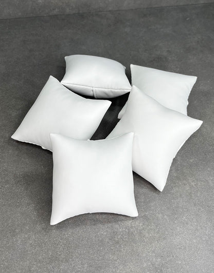 DIS6130 = White Leatherette Pillow for Watches or Bracelets 3''x3'' (Pkg of 5)