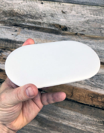 DIS6312 = White Leatherette Oval Display Pad 4'' x 7'' (Pkg/2)