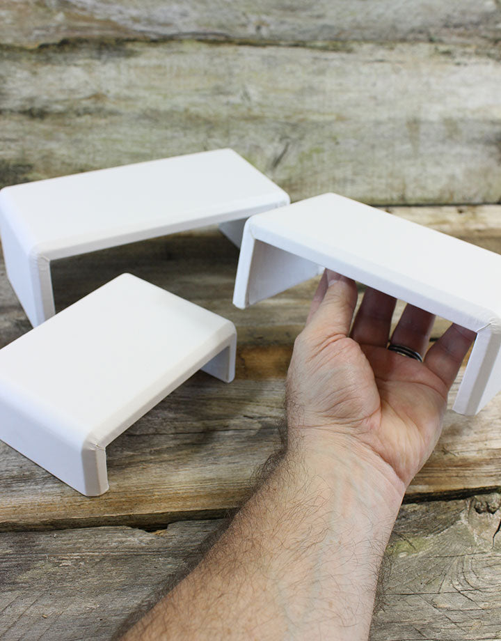 DIS6516 = White Leatherette Riser Set of 3pcs
