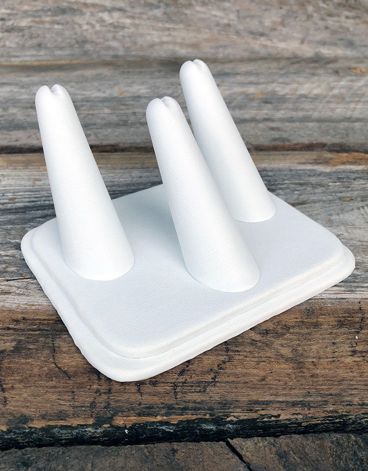 DRG6433 = White Leatherette Three Finger Ring Display 4'' x 3-1/4''