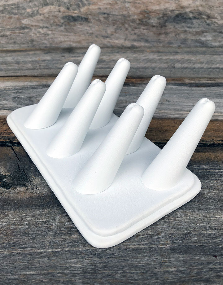 DRG6437 = White Leatherette Seven Finger Ring Display 6-3/4" x 3-7/8"