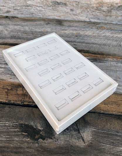DRG6810 = White Leatherette Ring Tray with 25 Slots