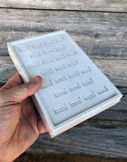 DRG6810 = White Leatherette Ring Tray with 25 Slots
