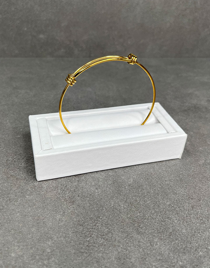 DRG6901 = White Leatherette Ring Slot Display 4-1/8"