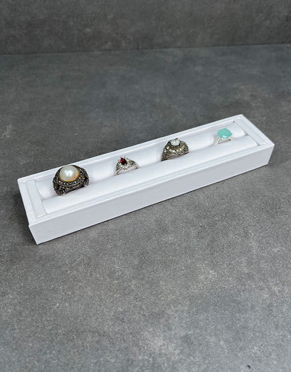 DRG6903 = White Leatherette Ring Slot Display 7-3/4"