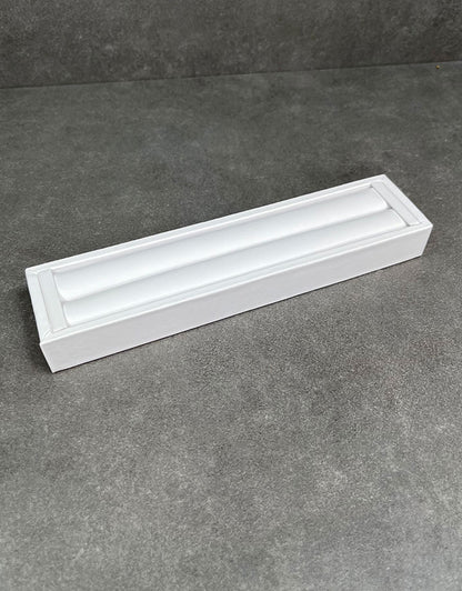DRG6903 = White Leatherette Ring Slot Display 7-3/4"